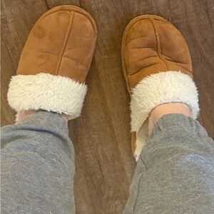 Cozy Tan Women's Slippers well worn by tired mom